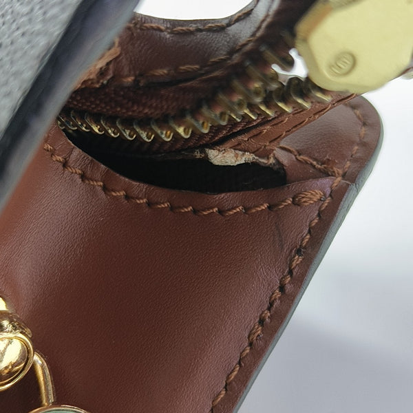Monogram Coated Canvas Clutch Brown