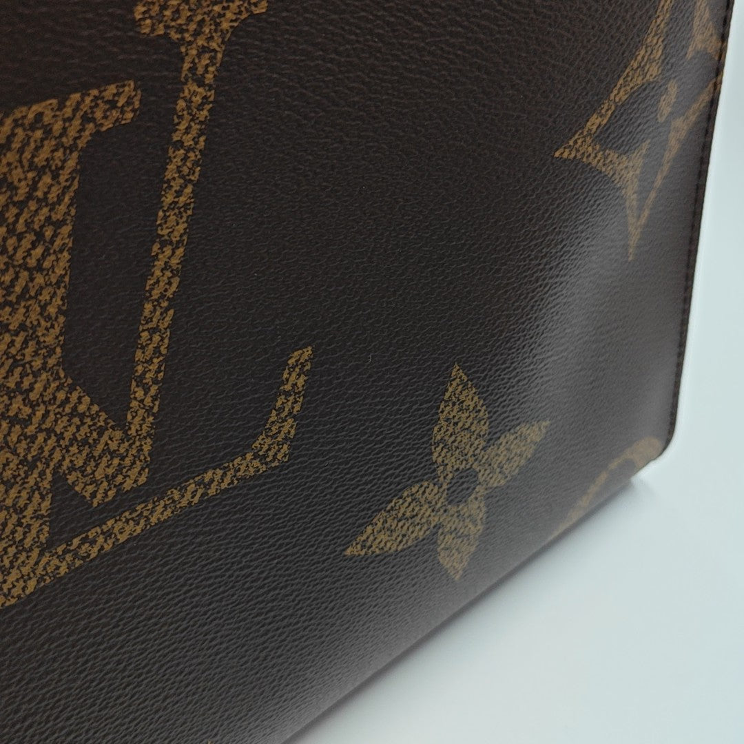 ONTHEGO MM Monogram Coated Canvas Brown