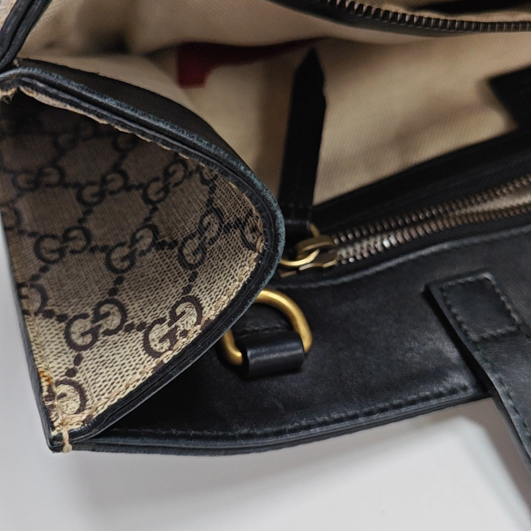 GG Supreme Monogram Coated Canvas Brown