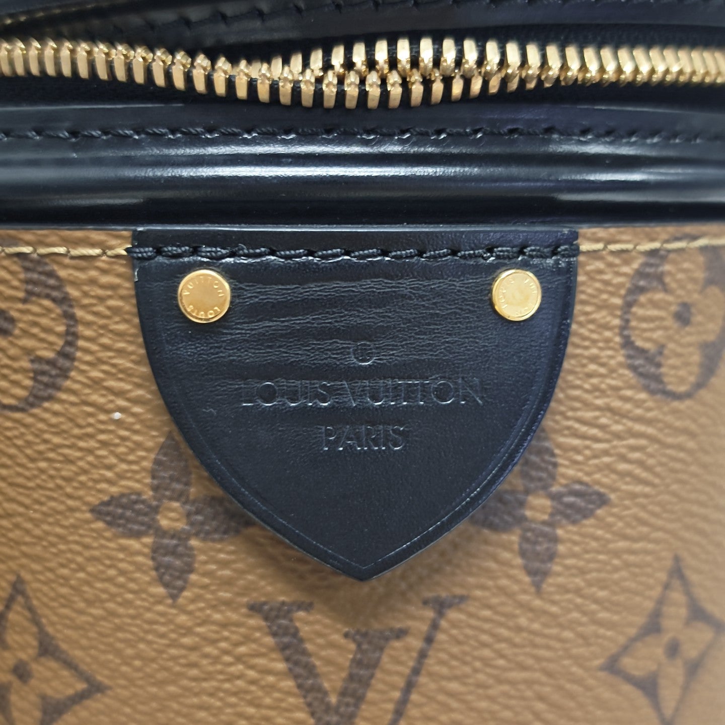 CANNES PM Monogram Coated Canvas Brown