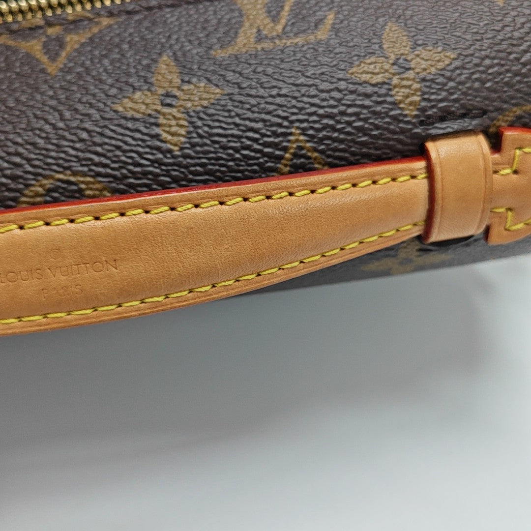 MÉTIS EAST WEST Monogram Coated Canvas Brown