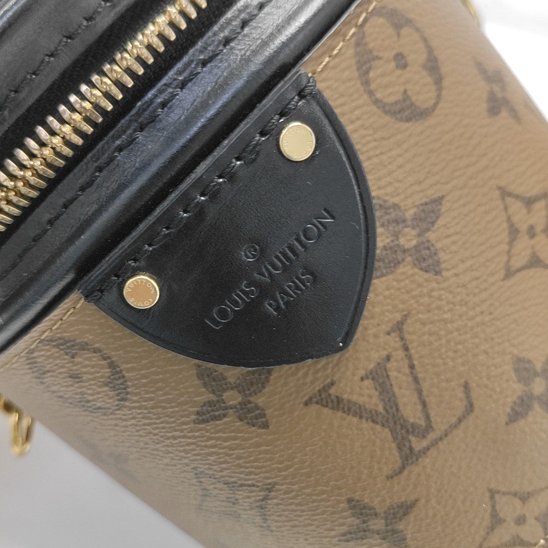 CANNES PM Monogram Coated Canvas Brown