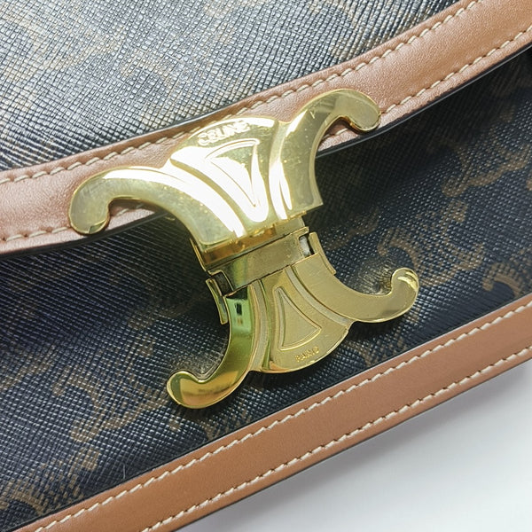 TRIOMPHE Small Coated Canvas Brown