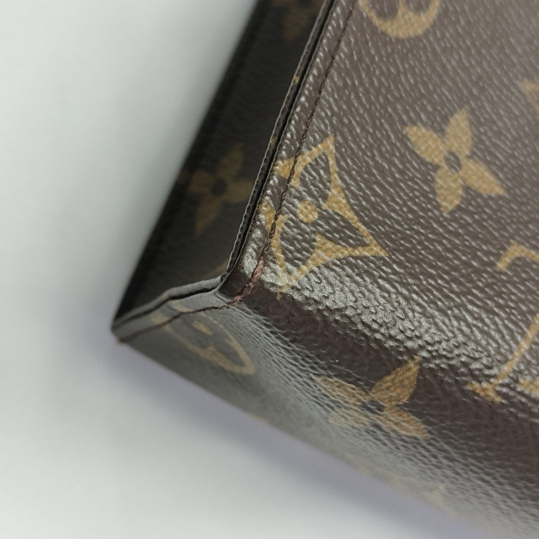 TOILET POCKET 26 Monogram Coated Canvas Brown