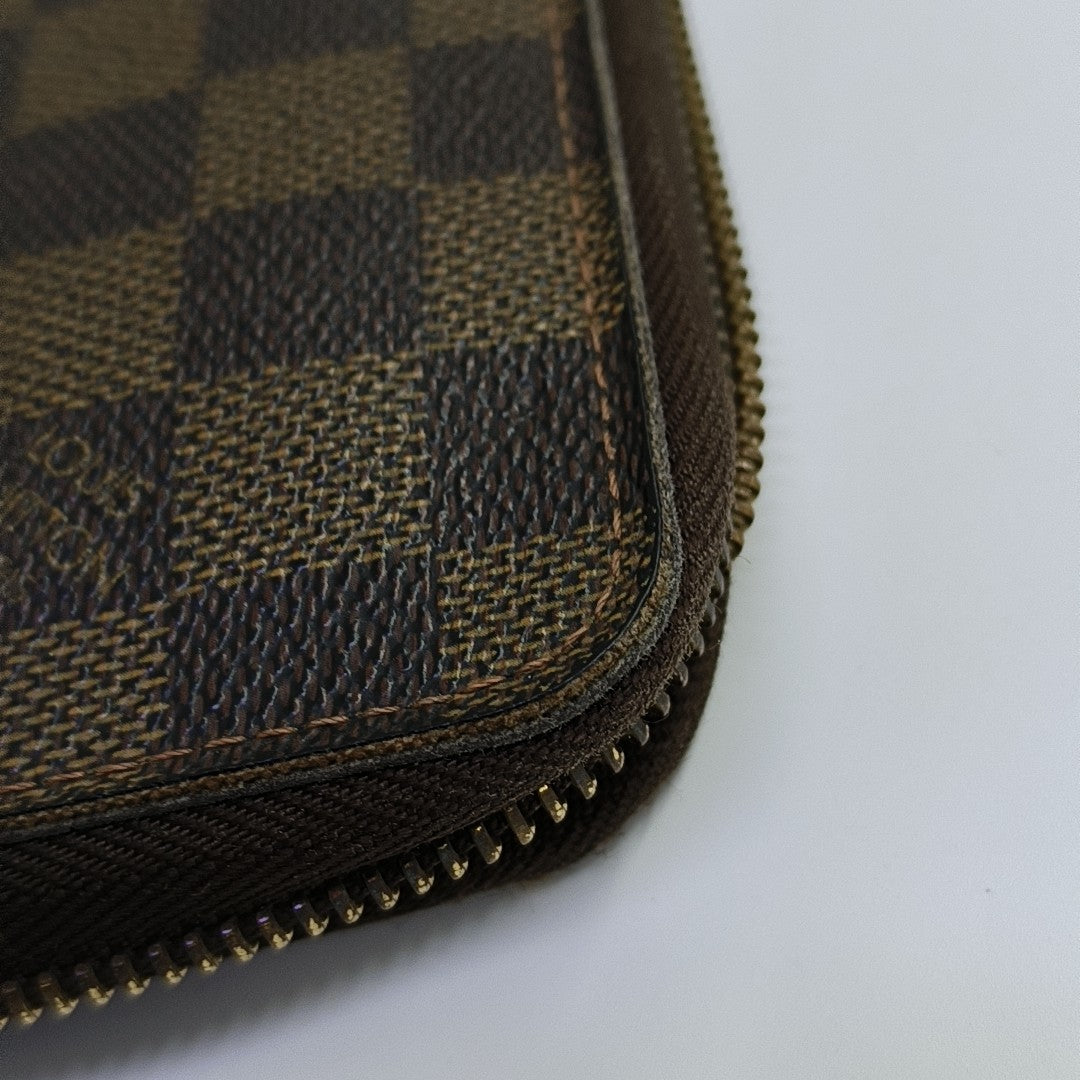 ZIPPY Damier Ebene Coated Canvas Brown Wallet