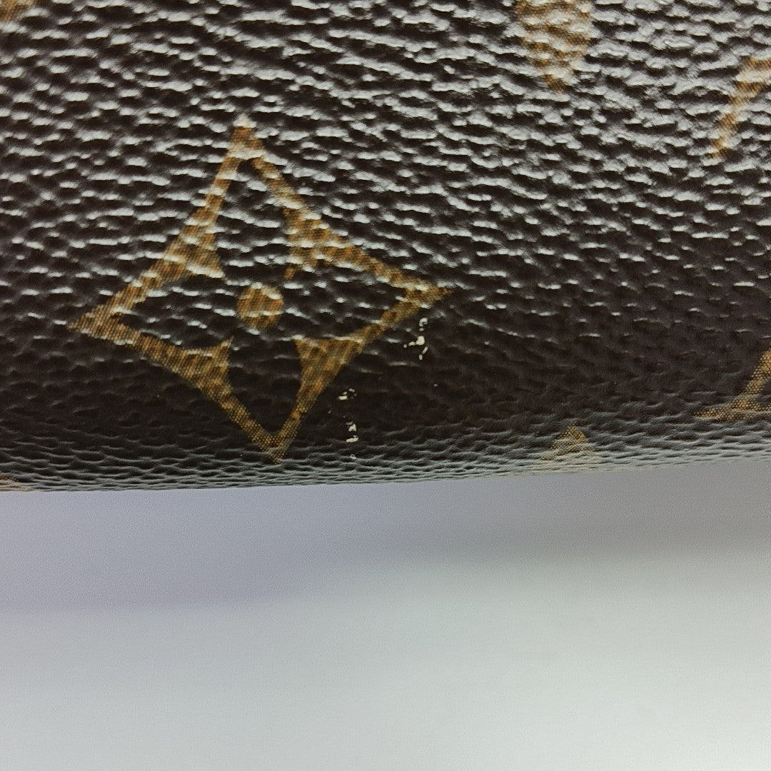 TOILET POCKET 19 Monogram Coated Canvas Brown