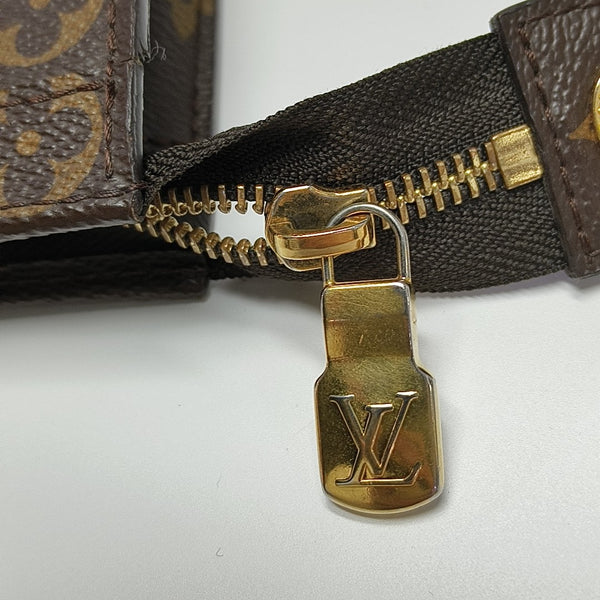 Pochette Voyag MM Monogram Coated Canvas Blue