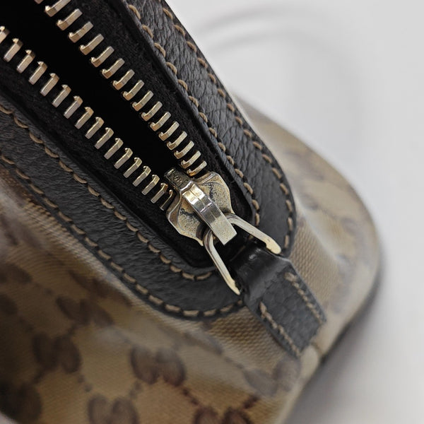 Dome Monogram Coated Canvas Brown