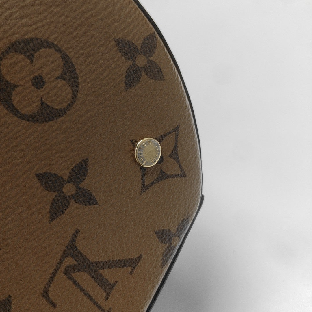 CANNES PM Monogram Coated Canvas Brown