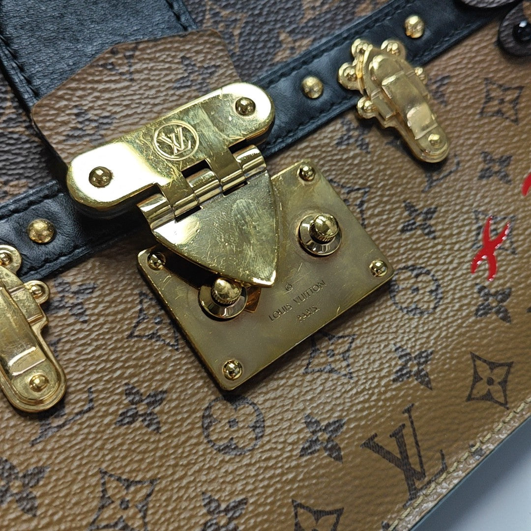 TRUNK Monogram Coated Canvas Brown