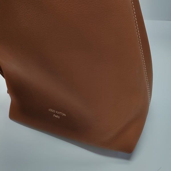 LOW KEY HOBO PM Monogram Calfskin Brown