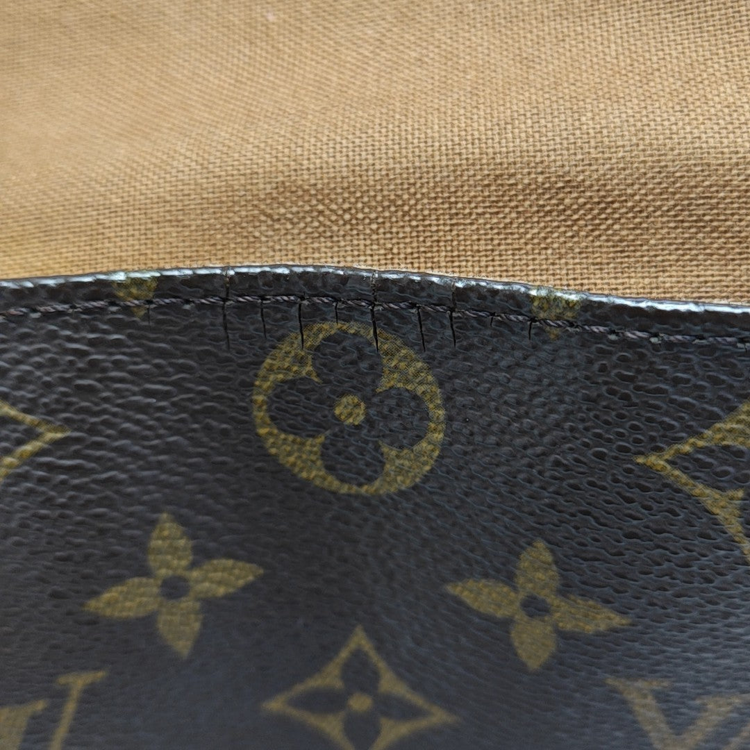 LOOPING PM Monogram Coated Canvas Brown