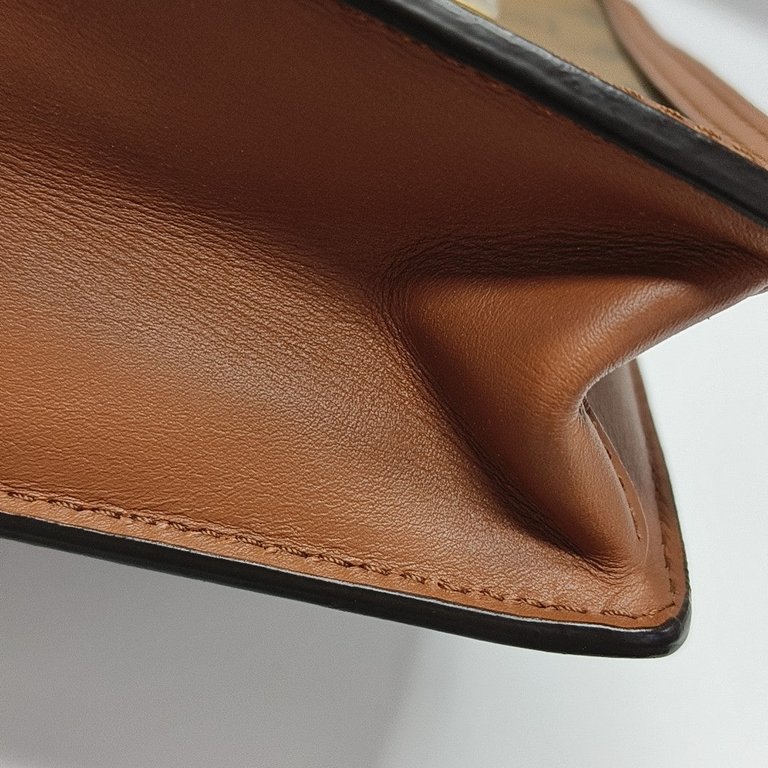 DAUPHINE WOC Monogram Coated Canvas Brown