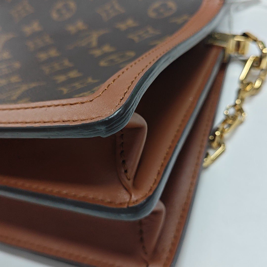 DAUPHINE MM Monogram Coated Canvas Brown