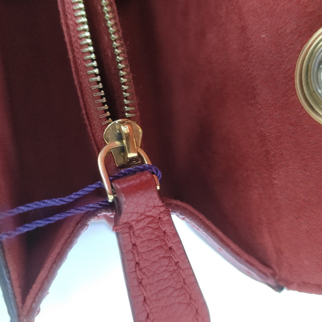 VICTOIRE Monogram Coated Canvas Brown