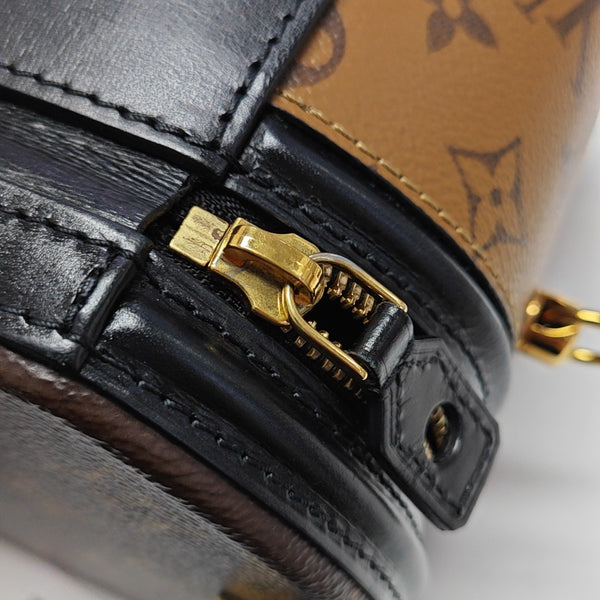 CANNES PM Monogram Coated Canvas Brown