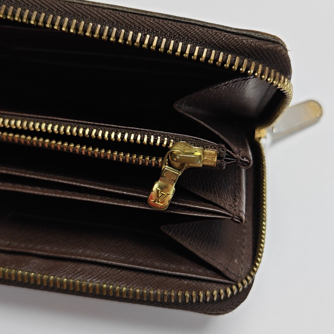 ZIPPY Damier Ebene Coated Canvas Brown Wallet