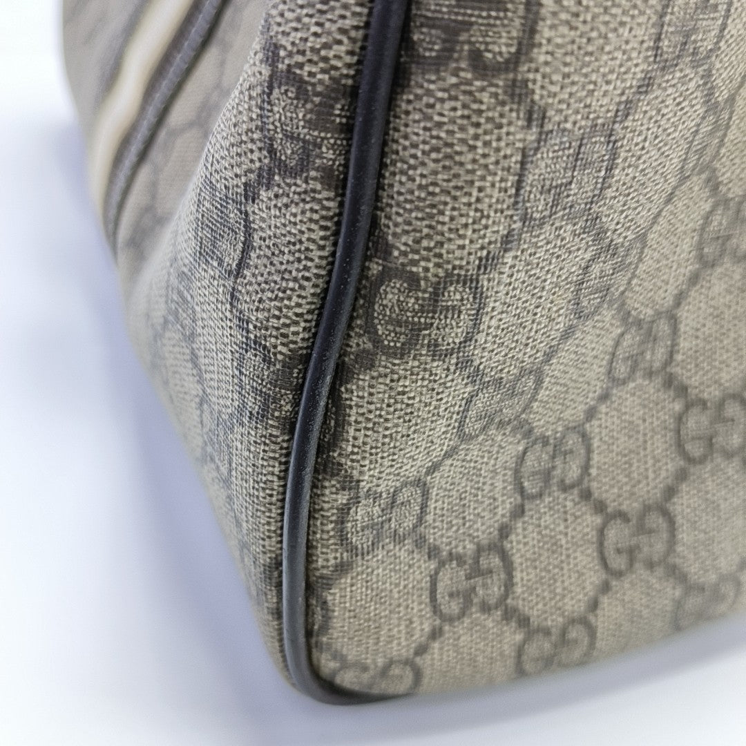Monogram Coated Canvas Top Handle Bag Brown