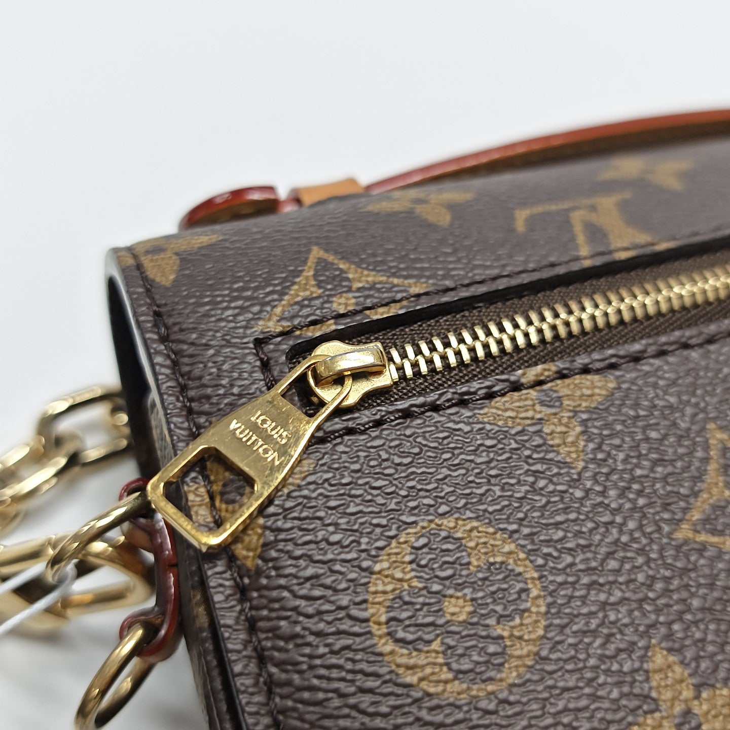 MÉTIS EAST WEST Monogram Coated Canvas Brown