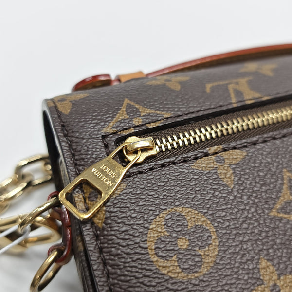 MÉTIS EAST WEST Monogram Coated Canvas Brown