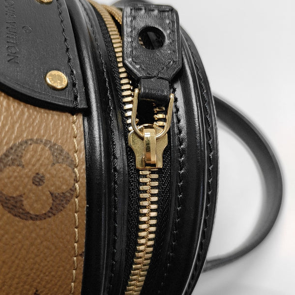 CANNES PM Monogram Coated Canvas Brown