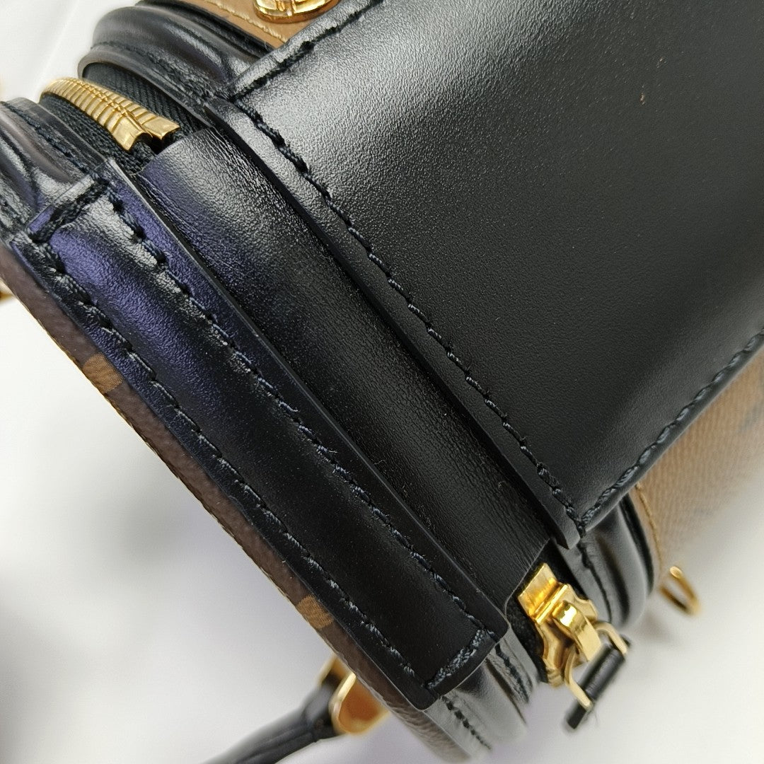 CANNES PM Monogram Coated Canvas Brown