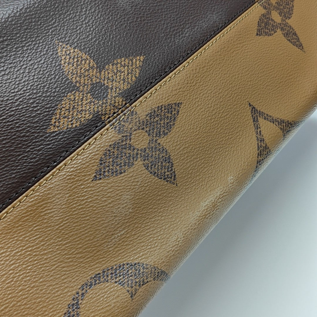 ONTHEGO GM Monogram Coated Canvas Brown