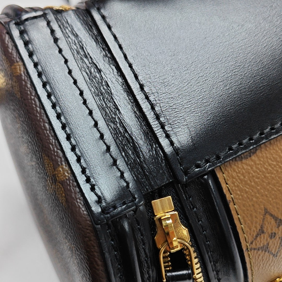 CANNES PM Monogram Coated Canvas Brown