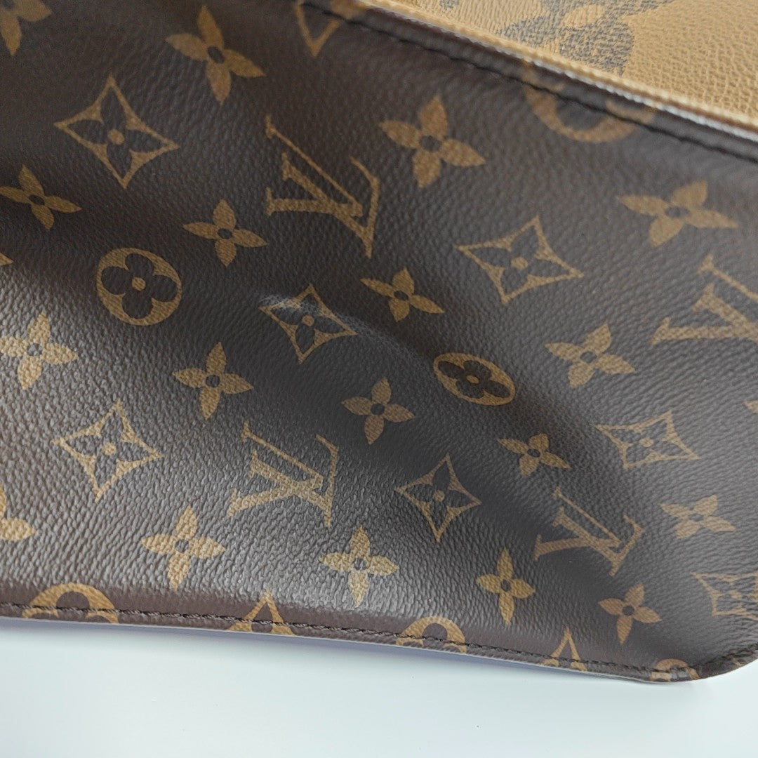 ONTHEGO MM Monogram Coated Canvas Brown
