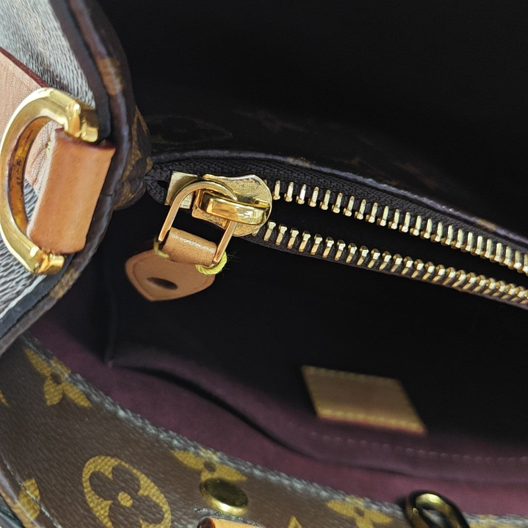 MONTAIGNE Monogram Coated Canvas Brown