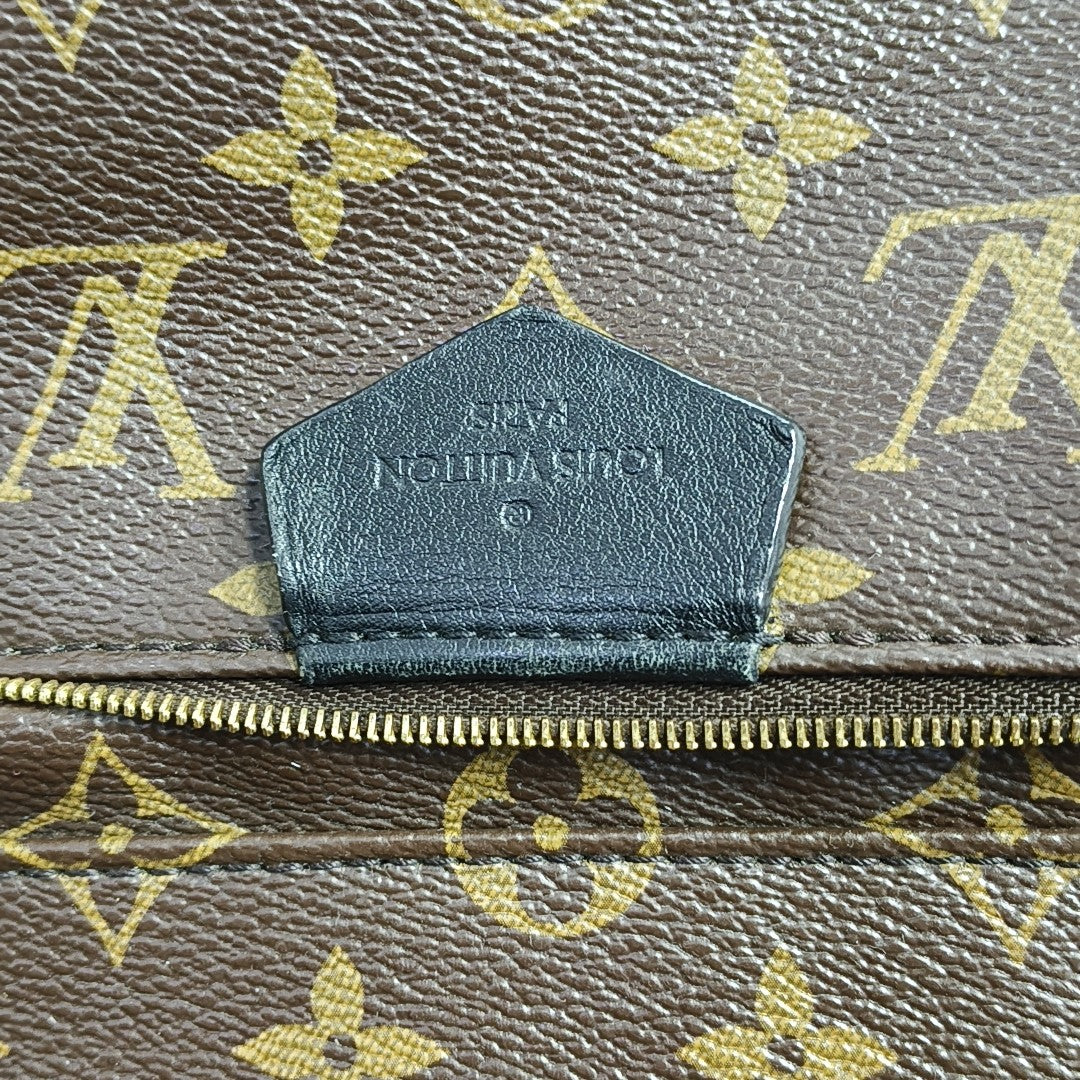 Monogram Coated Canvas Backpack Brown