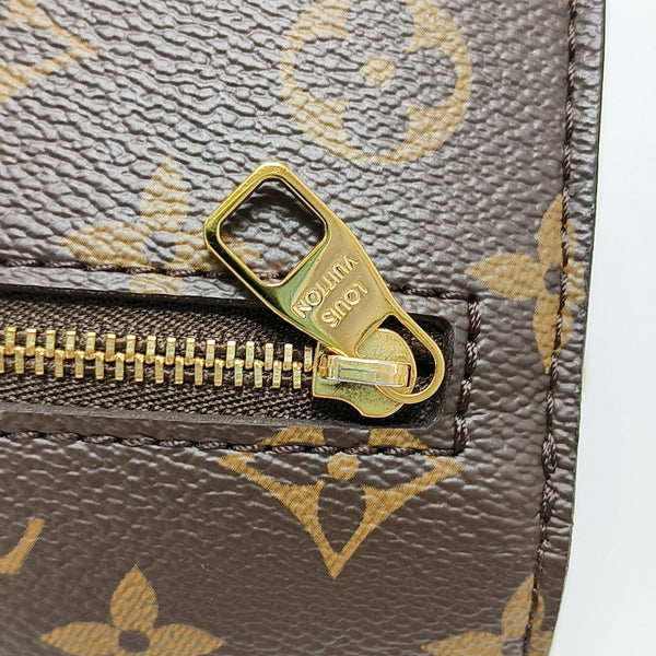MÉTIS EAST WEST Monogram Coated Canvas Brown