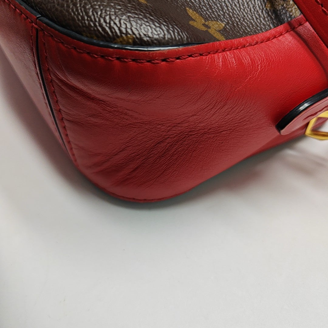 SAINTONGE Monogram Coated Canvas Brown