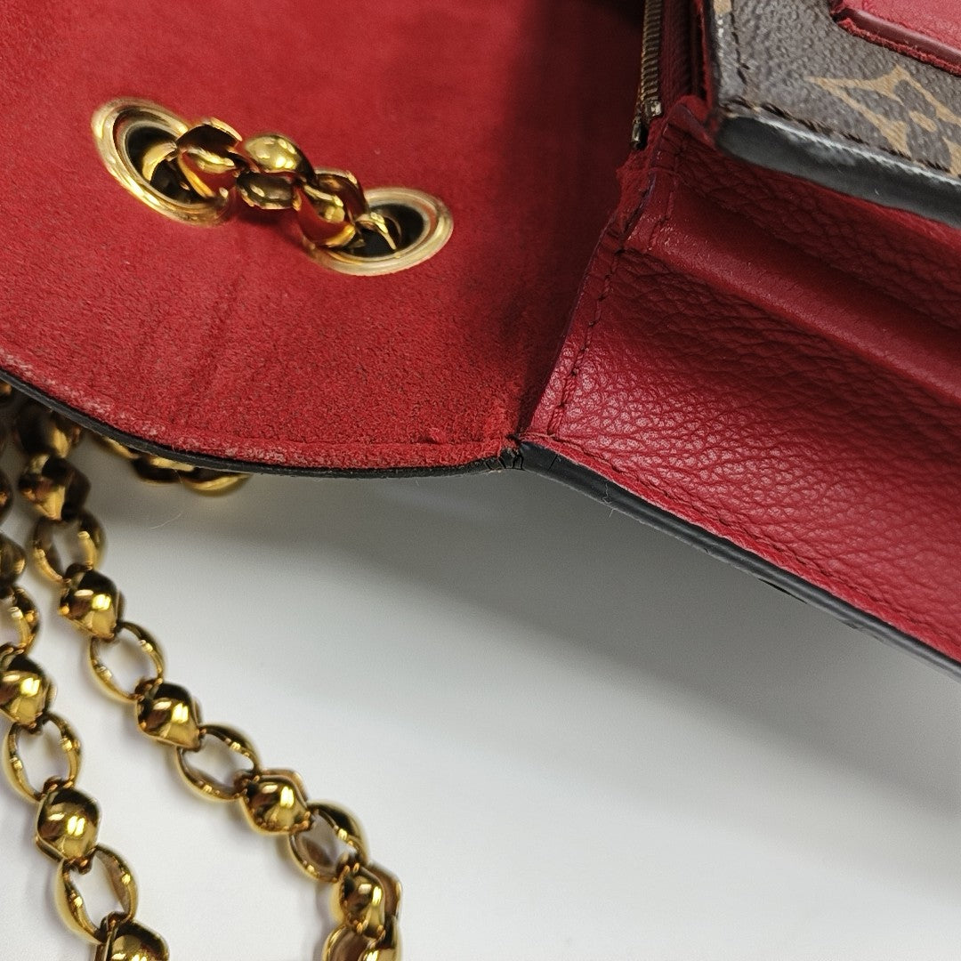 VICTOIRE Monogram Coated Canvas Brown