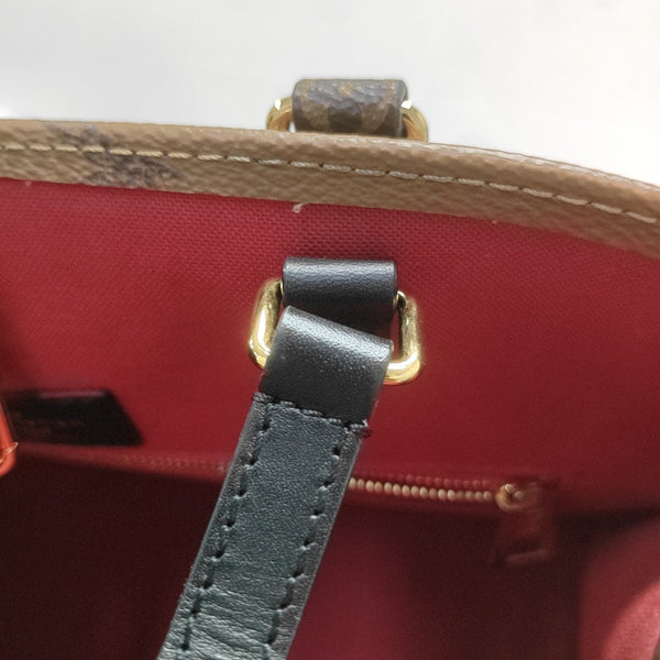 ONTHEGO MM Monogram Coated Canvas Brown