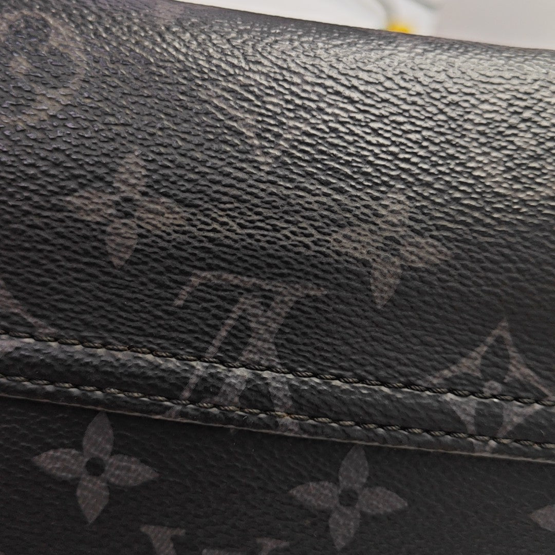 VOYAGER PM Monogram Coated Canvas Black