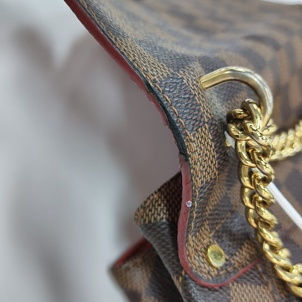 CAÏSSA Damier Ebene Coated Canvas Brown