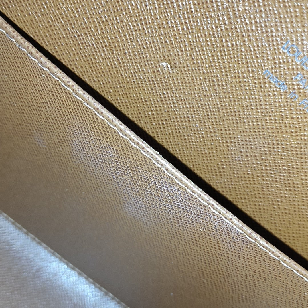 CITE MM Monogram Coated Canvas Brown