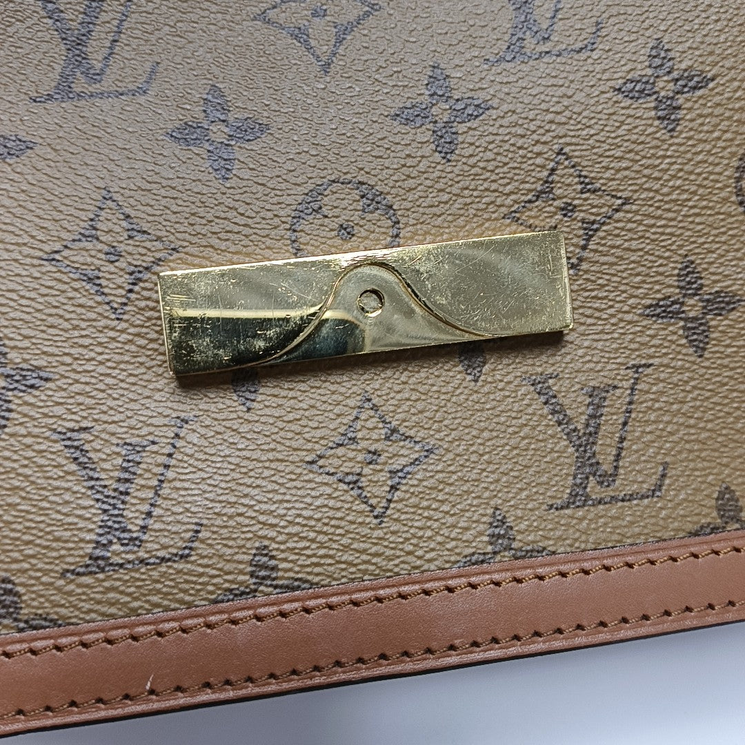 DAUPHINE MM Monogram Coated Canvas Brown