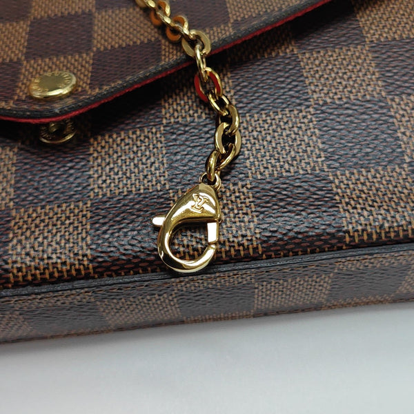 Authenticated pre-owned  FÉLICIE Coated Canvas Brown - Shoulder Bag at Looply
