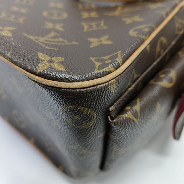 EXCENTRI-CITE Monogram Coated Canvas Brown