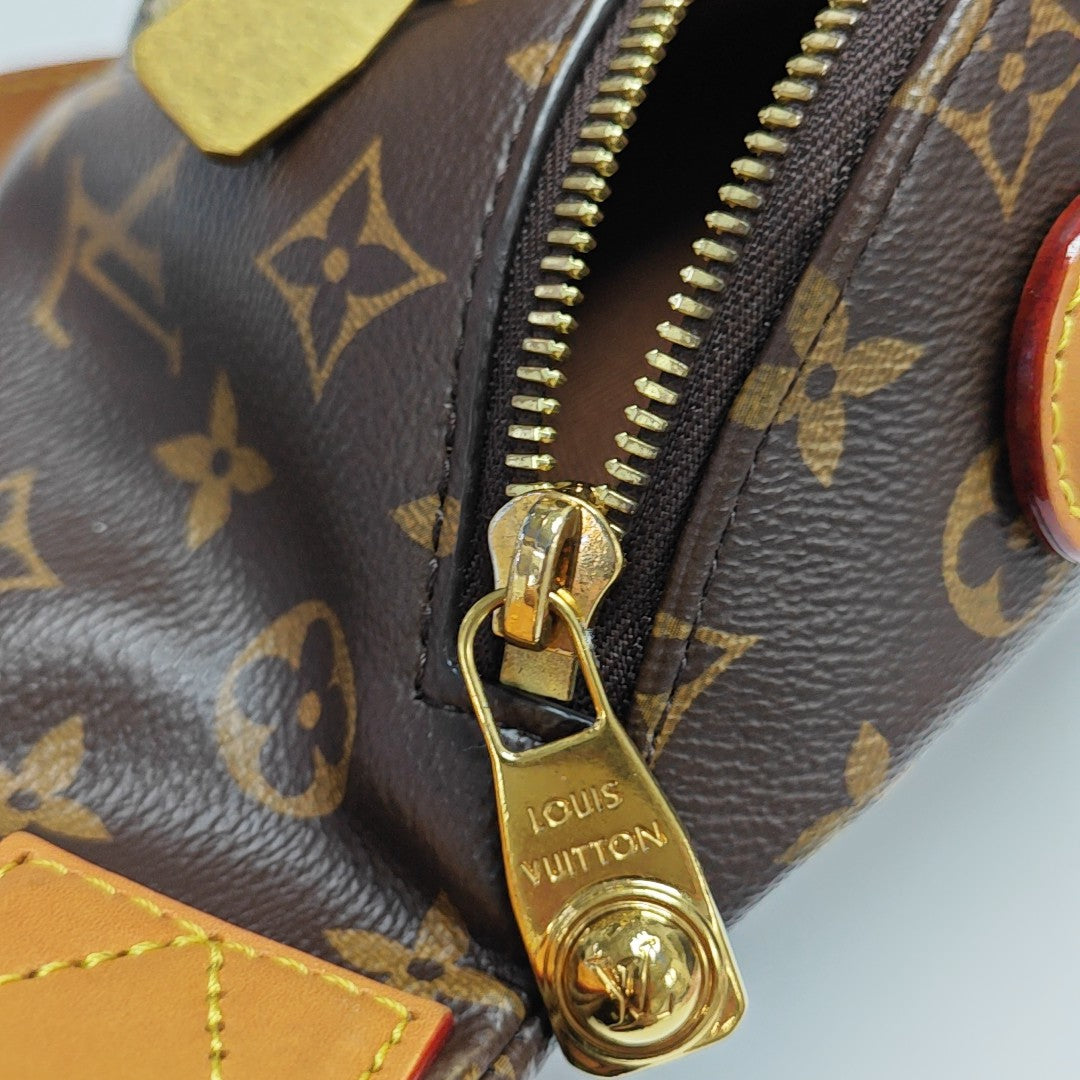 RUSH Monogram Coated Canvas Brown