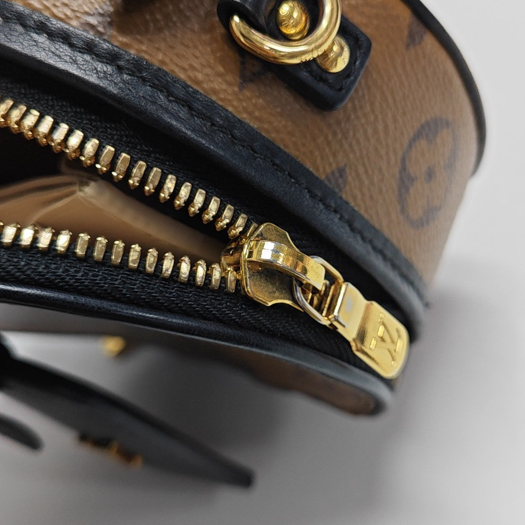 BOITE CHAPEAU Mini Monogram Coated Canvas Brown