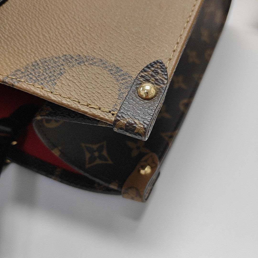 ONTHEGO MM Monogram Coated Canvas Brown