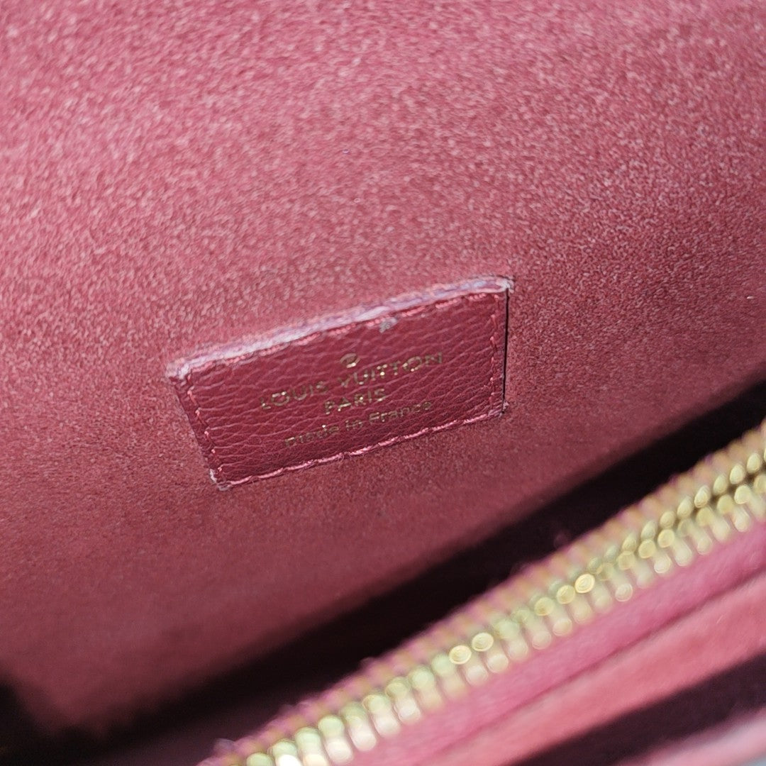 VICTOIRE Monogram Coated Canvas Brown