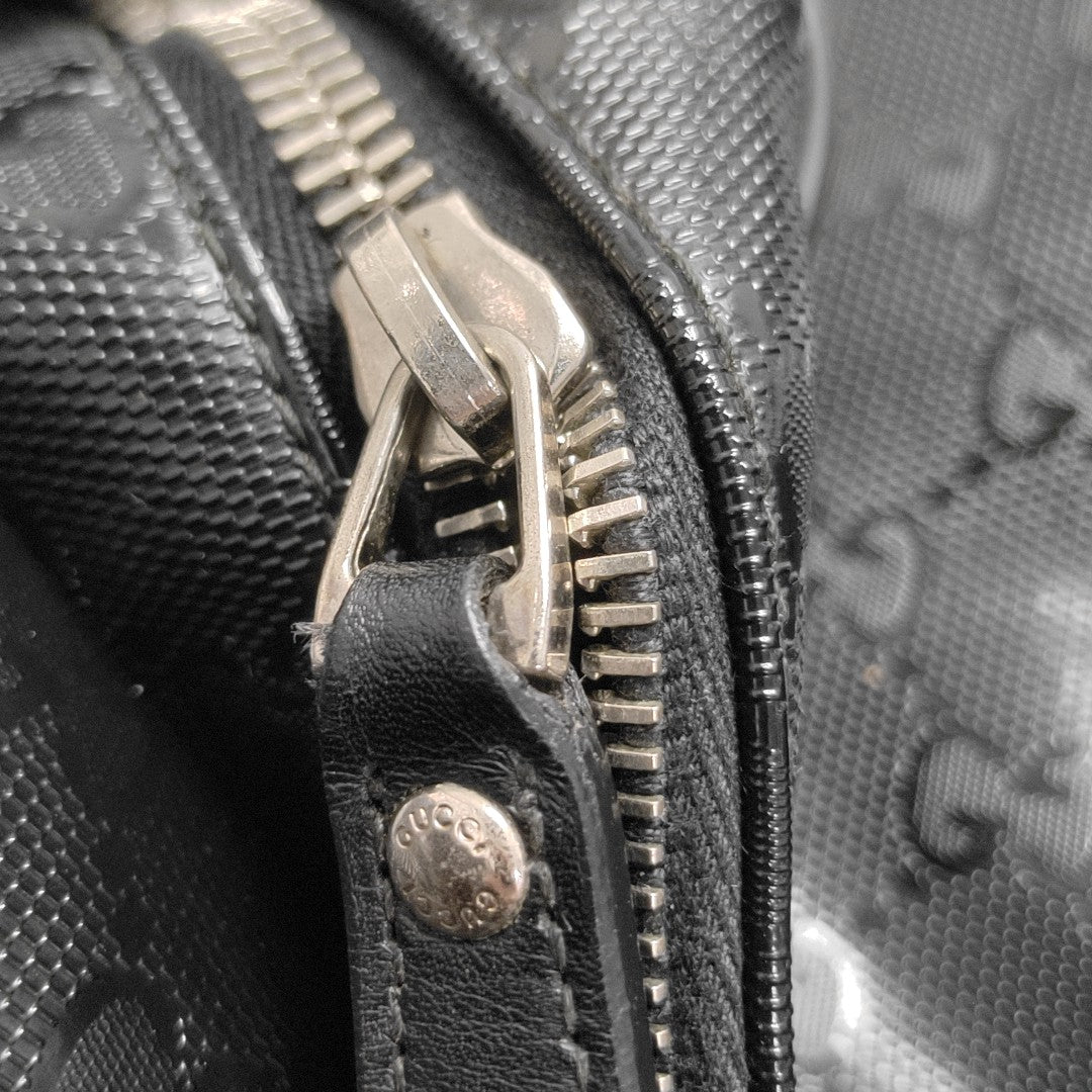 Monogram Coated Canvas Backpack Black