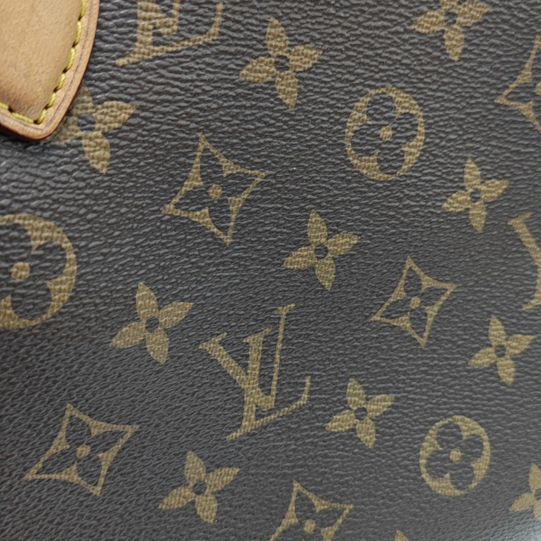 RIVOLI MM Monogram Coated Canvas Brown