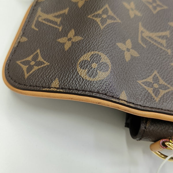 Pochette Camille Monogram Coated Canvas Brown