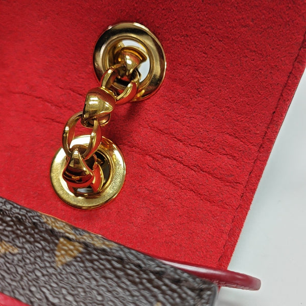 VICTOIRE Monogram Coated Canvas Brown