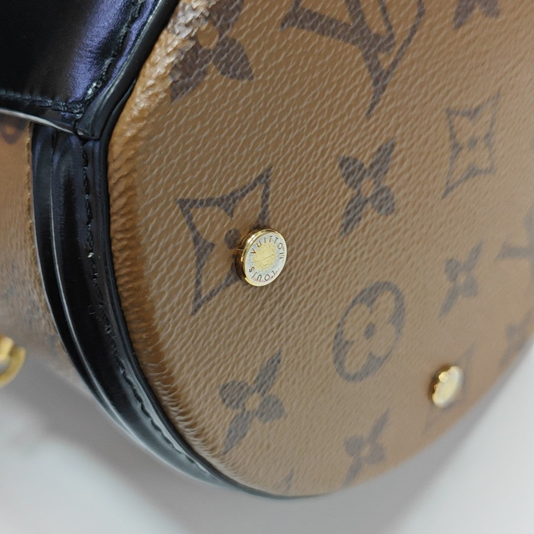 CANNES PM Monogram Coated Canvas Brown